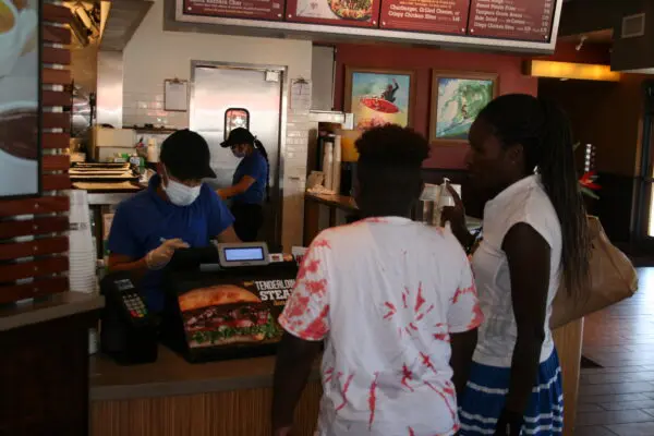 Fast-food companies seeing low-income diners pare orders